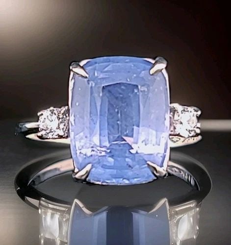 VINTAGE 14K WHITE GOLD ENGAGEMENT RING 8.94CT.NATURAL BLUE CUSHION SAPPHIRE GIA: VINTAGE 14K WHITE GOLD ENGAGEMENT RING 8.94CT.NATURAL BLUE CUSHION SAPPHIRE GIA Gorgeous Vintage 14K White Gold Natural Blue Sapphire Ring This stunning vintage ring showcases a natural cushion-cut bl