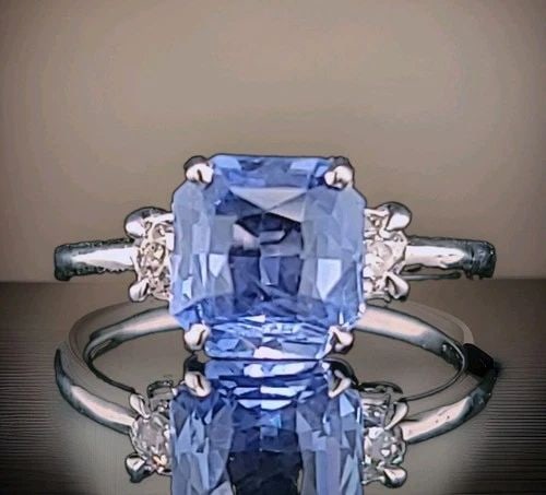 VINTAGE 14K WHITE GOLD ENGAGEMENT RING 2.75CT.NATURAL BLUE SAPPHIRE RADIANT GIA: VINTAGE 14K WHITE GOLD ENGAGEMENT RING 2.75CT.NATURAL BLUE SAPPHIRE RADIANT GIA Elegant vintage 14K white gold ring featuring a natural 2.75ct radiant-cut blue sapphire measuring 8.2× 7.9 mm. The sap
