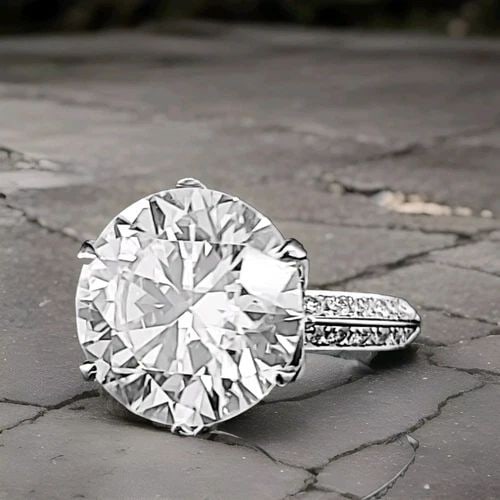 9.18CT PLATINUM VINTAGE ENGAGEMENT RING LAB GROWN SIMULATE ROUND DIAMOND: 9.18CT PLATINUM VINTAGE ENGAGEMENT RING LAB GROWN SIMULATE DIAMOND This stunning vintage engagement ring is the perfect choice for any special occasion. Crafted from high-quality platinum, this ring f