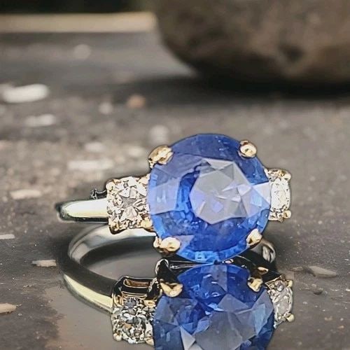 VINTAGE 14K GOLD ENGAGEMENT RING 3.65CT. NATURAL BLUE SAPPHIRE ROUND SHAPE: VINTAGE 14K GOLD ENGAGEMENT RING 3.65CT. NATURAL BLUE SAPPHIRE ROUND SHAPE VINTAGE 14k white & gold DIAMOND AND SAPPHIRE engagement RING CENTER NATURAL BLUE SAPPHIRE IN ROUND CUT WEIGHT 3.65CT SIZE 9.