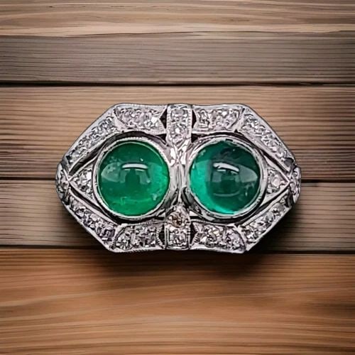 2.15CT. PLATINUM VINTAGE FILIGREE NATURAL EMERALD CABOCHON RING CIRC 1930'S: 2.15CT. PLATINUM VINTAGE FILIGREE NATURAL EMERALD CABOCHON RING CIRC 1930'S This stunning vintage ring boasts a beautiful natural emerald cabochon set in a platinum band with a pavé setting style. Th