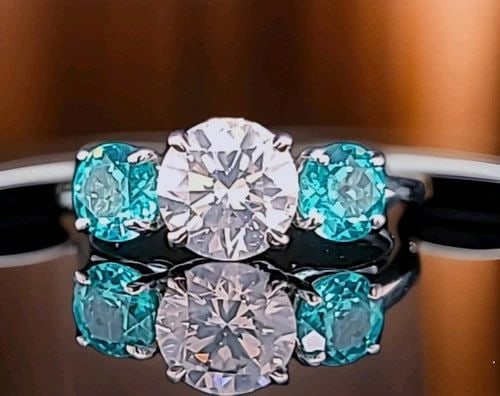 VINTAGE 14K WHITE GOLD ENGAGEMENT RING 1.47CT.NATURAL ROUND DIAMOND TOURMALINE: VINTAGE 14K WHITE GOLD ENGAGEMENT RING 1.47CT.NATURAL ROUND DIAMOND TOURMALINE Vintage 14K white gold three-stone engagement ring featuring a beautiful natural round brilliant-cut diamond and vibrant 