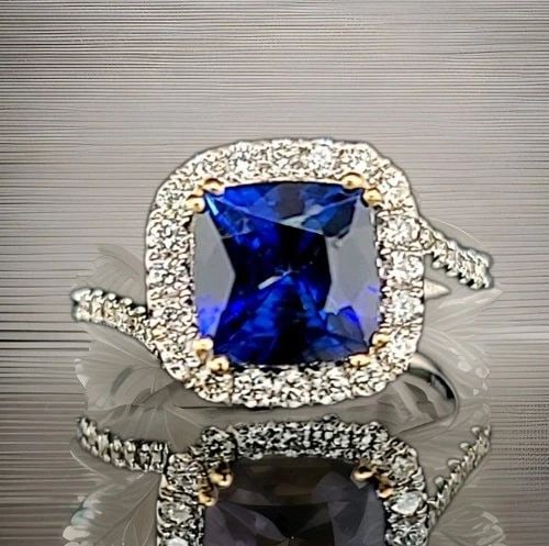18K WHITE & YELLOW GOLD ENGAGEMENT RING 3.09CT. NATURAL BLUE SAPPHIRE CUSHION: 18K WHITE & YELLOW GOLD ENGAGEMENT RING 3.09CT. NATURAL BLUE SAPPHIRE CUSHION GORGEOUS 18k white & Yellow gold sapphire engagement ring center natural treated diffused blue sapphire cushion shape weig
