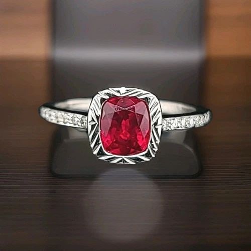 14K WHITE GOLD ENGAGEMENT RING 1.28CT. NATURAL UNHEATED RUBY CUSHION GIA CERT: 14K WHITE GOLD ENGAGEMENT RING 1.28CT. NATURAL UNHEATED RUBY CUSHION GIA CERT Gorgeous ring crafted in 14k white gold ring natural untreated cushion shape ruby weight 1.28ct. size 6.1x5.4x4.2 This rub
