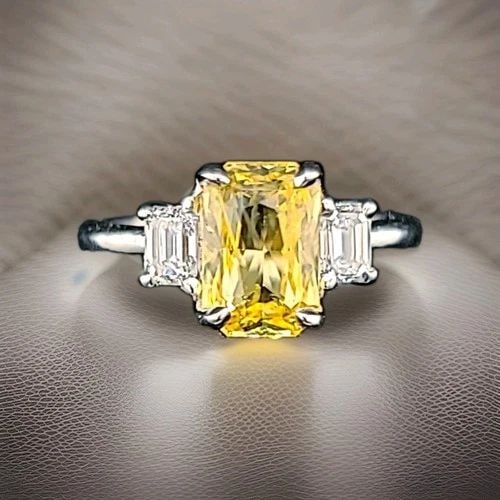 VINTAGE PLATINUM ENGAGEMENT RING 2.35CT.NATURAL YELLOW RADIANT SAPPHIRE GIA CERT: VINTAGE PLATINUM ENGAGEMENT RING 2.35CT.NATURAL YELLOW RADIANT SAPPHIRE GIA CERT Here is an outstanding natural yellow sapphire engagement ring, the beautiful three-stone yellow sapphire design gives 