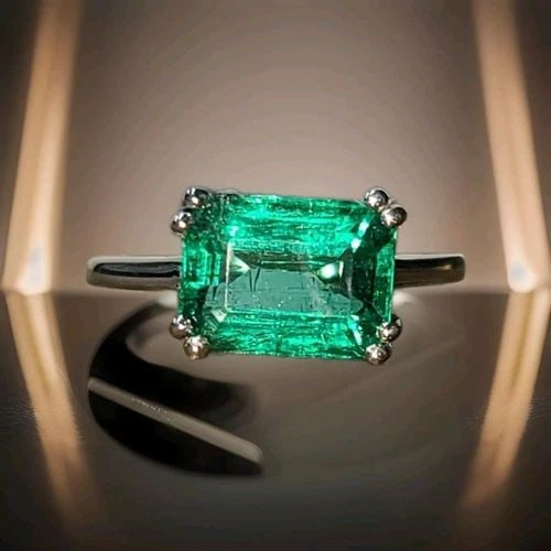 14K WHITE GOLD VINTAGE ENGAGEMENT RING 3.45CT NATURAL GREEN EMERALD RECTANGULAR: 14K WHITE GOLD VINTAGE ENGAGEMENT RING 3.45CT NATURAL GREEN EMERALD RECTANGULAR This vintage engagement ring is a stunning piece of fine jewelry that will capture her heart. The 14k white gold band ho