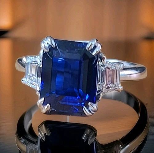 14K WHITE GOLD ENGAGEMENT RING 5.52CT.LAB GROWN BLUE SAPPHIRE EMERALD SHAPE: VINTAGE 14K WHITE GOLD ENGAGEMENT RING 5.52CT. BLUE SAPPHIRE EMERALD SHAPE GORGEOUS vintage 14K WHITE GOLD engagement ring blue sapphire in emerald shape. the center treated diffused natural blue sapp