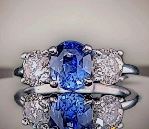 VINTAGE 14K WHITE GOLD ENGAGEMENT RING 1.86CT.NATURAL BLUE OVAL SAPPHIRE GIA: VINTAGE 14K WHITE GOLD ENGAGEMENT RING 1.86CT.NATURAL BLUE OVAL SAPPHIRE GIA This elegant vintage ring features a natural oval-cut blue sapphire weighing 1.86ct and measuring 7.1 × 5.9mm. The sapphir