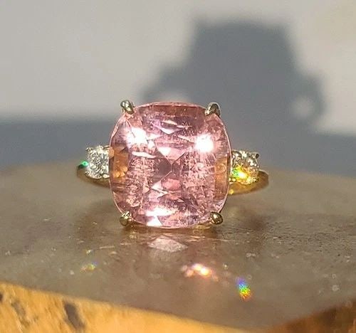 VINTAGE 14K YELLOW GOLD ENGAGEMENT RING 9.07CT. NATURAL PINK TOURMALINE CUSHION: VINTAGE 14K YELLOW GOLD ENGAGEMENT RING 9.07CT. NATURAL PINK TOURMALINE CUSHION This Vintage 14k Yellow Gold Engagement Ring features a stunning 9.07ct. Natural Pink Tourmaline in a cushion shape. The