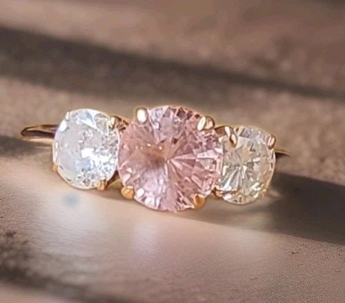 VINTAGE 14K ROSE GOLD ENGAGEMENT RING 2.18CT.NATURAL ROUND PADPARADCHA SAPPHIRE: VINTAGE 14K ROSE GOLD ENGAGEMENT RING 2.18CT.NATURAL ROUND PADPARADCHA SAPPHIRE This exquisite 14K rose gold ring showcases a 2.18-carat natural, size 7.1mm untreated padparadscha sapphire in a round 
