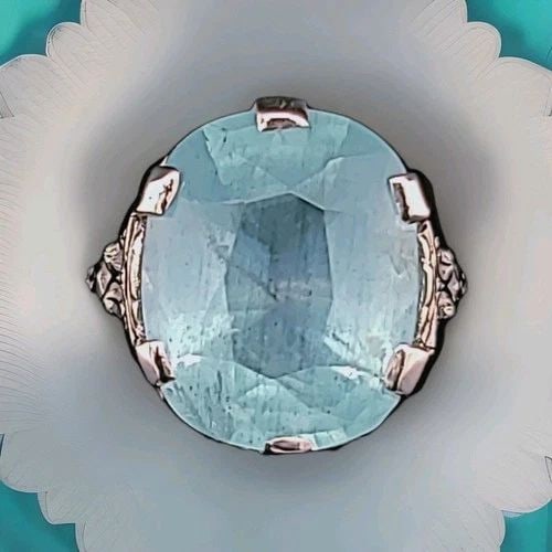 VINTAGE 14K WHITE GOLD RING 12.19CT. NATURAL SKY BLUE AQUAMARINE CUSHION SHAPE: VINTAGE 14K WHITE GOLD RING 12.19CT. NATURAL SKY BLUE AQUAMARINE CUSHION SHAPE Stunning vintage Retro-era ring (circa 1935–1950) crafted in 14K white gold, featuring a magnificent natural aquamarine