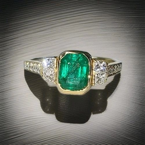 VINTAGE 18K YELLOW GOLD ENGAGEMENT RING 1.69CT NATURAL GREEN EMERALD BEZEL SET: VINTAGE 18K YELLOW GOLD ENGAGEMENT RING 1.69CT NATURAL GREEN EMERALD BEZEL SET This vintage 18K yellow gold engagement ring features a natural 1.69ct green emerald set in a bezel setting, showcasing a