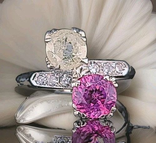 VINTAGE 14K WHITE GOLD ENGAGEMENT RING 2.42CT.NATURAL PINK TOURMALINE & DIAMOND: VINTAGE 14K WHITE GOLD ENGAGEMENT RING 2.42CT.NATURAL PINK TOURMALINE & DIAMOND This beautiful vintage 14K white gold engagement ring showcases a natural 1.32 ct round pink tourmaline (approx. 7 mm) w