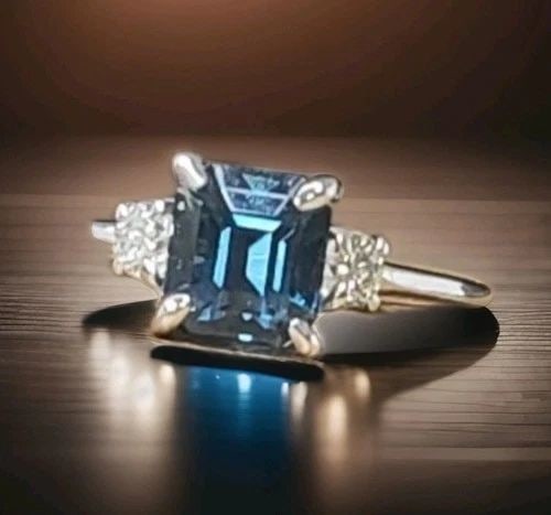 VINTAGE 14K WHITE GOLD ENGAGEMENT RING 2.04CT. NATURAL BLUE SPINEL RADIANT GIA: VINTAGE 14K WHITE GOLD ENGAGEMENT RING 2.04CT. NATURAL BLUE SPINEL RADIANT GIA This exquisite vintage 14K white gold engagement ring features a stunning natural, untreated teal blue spinel in a radian