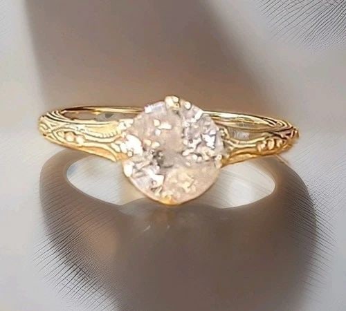 14K YELLOW GOLD VINTAGE FILIGREE ENGAGEMENT RING 1.25CT. NATURAL ROUND DIAMOND: 14K YELLOW GOLD VINTAGE FILIGREE ENGAGEMENT RING 1.25CT. NATURAL ROUND DIAMOND This stunning vintage Art Deco filigree engagement ring is expertly crafted in solid 14K yellow gold and showcases a natu
