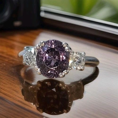14K WHITE GOLD 2.83CT OVAL NATURAL PURPLE SAPPHIRE ENGAGEMENT RING: 14K WHITE GOLD ENGAGEMENT RING 2.83CT. NATURAL PURPLE SAPPHIRE OVAL CUT GORGEOUS 14K white GOLD natural purple sapphire engagement ring Center natural oval purple sapphire weight 2.83ct. size 8.3x7.3m