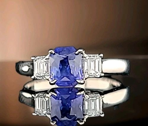 14K WHITE GOLD ENGAGEMENT RING 1.34CT. NATURAL UNTREATED BLUE SAPPHIRE RADIANT: 14K WHITE GOLD ENGAGEMENT RING 1.34CT. NATURAL UNTREATED BLUE SAPPHIRE RADIANT GORGEOUS 14K WHITE GOLD engagement ring natural blue Ceylon sapphire in radiant shape, center weight 1.34carat. size 6.2x