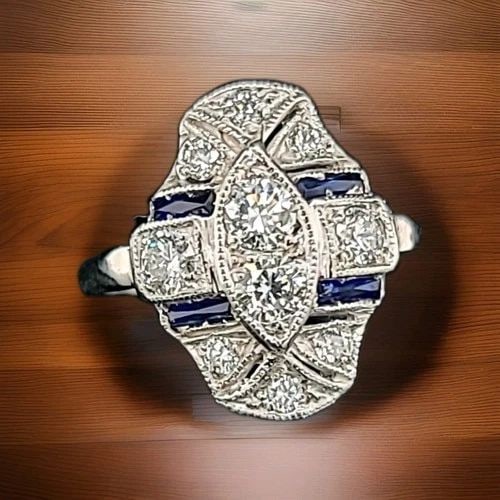 14K WHITE GOLD VINTAGE FILIGREE ART DECO RING 0.77CT. NATURAL DIAMOND SAPPHIRE: 14K WHITE GOLD VINTAGE FILIGREE ART DECO RING 0.77CT. NATURAL DIAMOND Gorgeous Vintage art deco filigree 14k white gold Diamond ring circ 1930's center set two natural round cut natural diamond weight