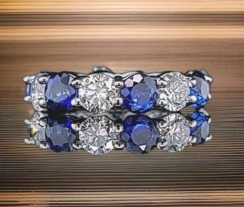 14K WHITE GOLD ETERNITY RING 9.73CT. DIAMOND BLUE SAPPHIRE ROUND SHAPE SIZE 6.5: 14K WHITE GOLD ETERNITY RING 9.73CT. DIAMOND BLUE SAPPHIRE ROUND SHAPE SIZE 6.5 This stunning eternity ring is crafted in solid 14K white gold, offering timeless elegance and modern luxury. The design