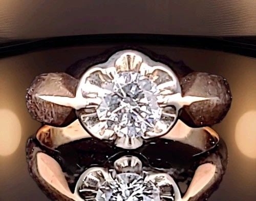 14K ROSE WHITE GOLD VINTAGE ENGAGEMENT RING 0.82CT.NATURAL ROUND CUT DIAMOND: 14K ROSE WHITE GOLD VINTAGE ENGAGEMENT RING 0.82CT.NATURAL ROUND CUT DIAMOND A stunning vintage engagement ring from the 1930s, beautifully crafted in 14K rose and white gold. This timeless piece show