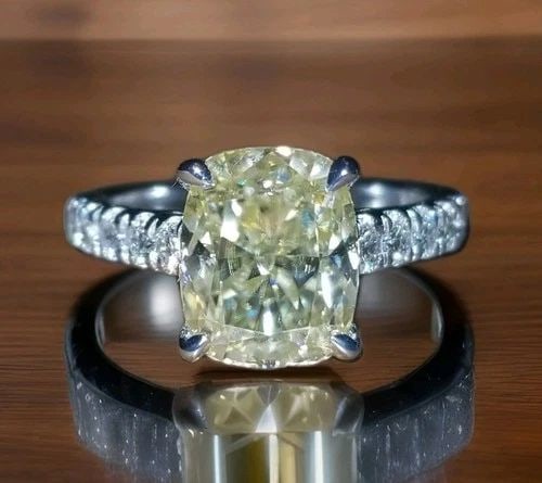 14K WHITE GOLD ENGAGEMENT RING 3.48CT. YELLOW MOISSANITE CUSHION SHAPE: 14K WHITE GOLD ENGAGEMENT RING 3.96CT. YELLOW MOISSANITE CUSHION SHAPE 14K WHITE GOLD ENGAGEMENT ring , 3.48CT cushion CUT yellow MOISSANITE AND side natural DIAMONDS. THIS BEAUTIFUL 3.48CT cushion cu
