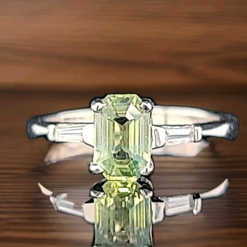 PLATINUM VINTAGE ENGAGEMENT RING 1.46CT.NATURAL GREEN SAPPHIRE EMERALD SHAPE GIA: 1.46CT PLATINUM VINTAGE ENGAGEMENT RING NATURAL GREEN SAPPHIRE EMERALD SHAPE Gorgeous Vintage Platinum Engagement ring circ 1940's center natural green sapphire in emerald shape weight 1.46ct. SIZE 7.
