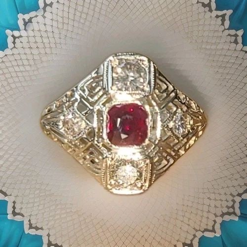 VINTAGE 14K WHITE GOLD ENGAGEMENT RING 0.82CT.NATURAL RUBY CUSHION SHAPE 1930'S: VINTAGE 14K WHITE GOLD ENGAGEMENT RING 0.82CT.NATURAL RUBY CUSHION SHAPE 1930'S This exquisite Art Deco ring is crafted in 14K white gold and showcases a stunning natural cushion-cut ruby weighing 0.8