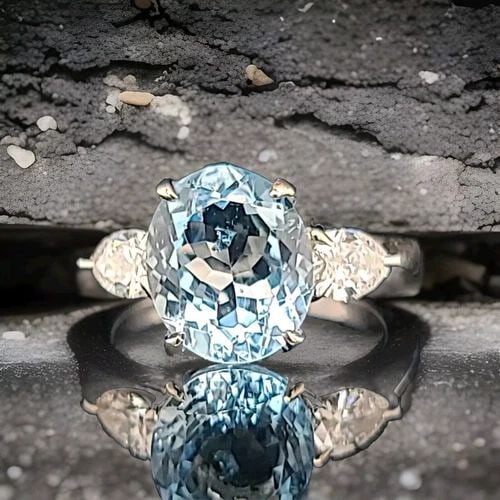 VINTAGE 14K WHITE GOLD ENGAGEMENT RING 3.02CT. NATURAL SKY BLUE AQUAMARINE OVAL: VINTAGE 14K WHITE GOLD ENGAGEMENT RING 3.02CT. NATURAL SKY BLUE AQUAMARINE OVAL This stunning vintage engagement ring features a beautiful oval-shaped natural sky blue aquamarine stone, which is 3.02 