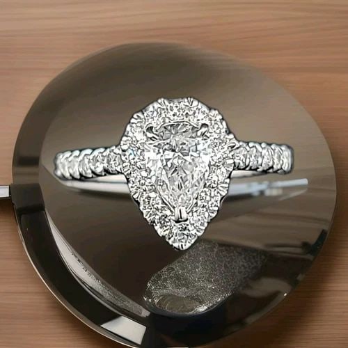 14K WHITE GOLD ENGAGEMENT RING NATURAL PEAR SHAPE DIAMOND 0.75CT: 14K WHITE GOLD ENGAGEMENT RING NATURAL PEAR SHAPE DIAMOND 0.75CT SI2-E GORGEOUS 14k white gold natural diamond in pear shape engagement ring center PEAR shape natural Diamond weight 0.75ct size 7x5.5m