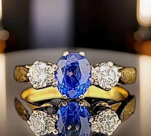 VINTAGE 18K GOLD ENGAGEMENT THREE STONES RING 0.99CT. NATURAL OVAL SAPPHIRE GIA: VINTAGE 18K GOLD ENGAGEMENT THREE STONES RING 0.95CT. NATURAL OVAL SAPPHIRE Here is an outstanding sapphire diamond engagement ring,the beautiful three stone sapphire design gives this ring amazing ap