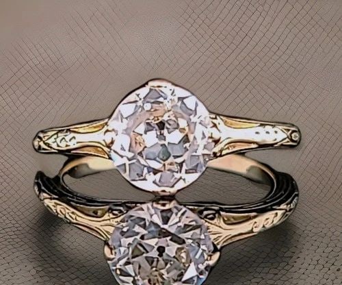 14K YELLOW GOLD VINTAGE ENGAGEMENT RING 1.45CT.LAB-GROWN OLD EURO DIAMOND: 14K YELLOW GOLD VINTAGE ENGAGEMENT RING 1.45CT.LAB-GROWN OLD EURO DIAMOND This stunning vintage Art Deco filigree engagement ring is crafted in solid 14K yellow gold and features a lab-grown Old Europ
