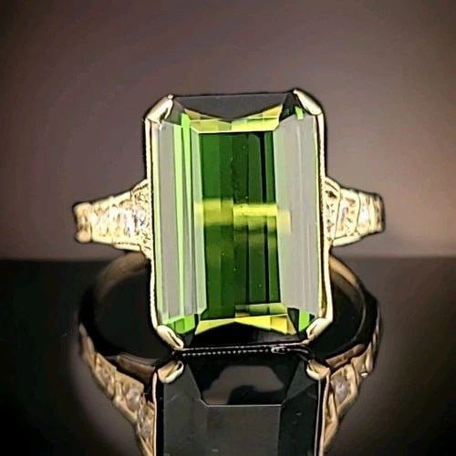 VINTAGE 14K YELLOW GOLD ENGAGEMENT RING 4.96CT. NATURAL GREEN TOURMALINE: VINTAGE 14K YELLOW GOLD ENGAGEMENT RING 4.96CT. NATURAL GREEN TOURMALINE Gorgeous Vintage 14k yellow gold natural green tourmaline in a rectangular shape center weight 4.96ct. size 13.8x9mm very nice 