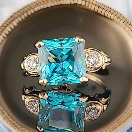 VINTAGE 14K YELLOW GOLD ENGAGEMENT RING 4.01CT. AQUAMARINE RADIANT SHAPE: VINTAGE 14K YELLOW GOLD ENGAGEMENT RING 4.01CT. AQUAMARINE RADIANT SHAPE Vintage 14K yellow gold ring aquamarine radiant shape circ 1930's center lab grown aquamarine in radiant shape weight 4.01ct. s