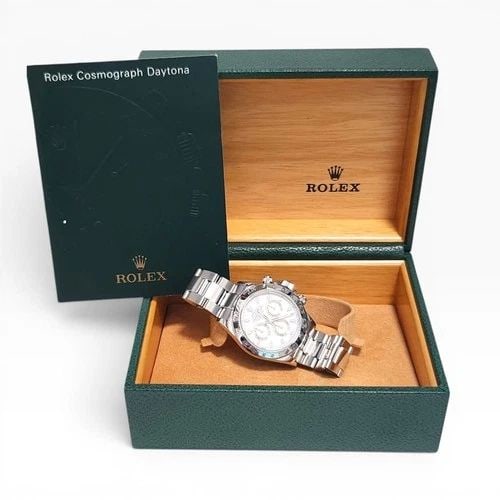 W/BOX ROLEX COSMOGRAPH DAYTONA 40MM WHITE DIAL WATCH 116520 Z SERIES 2007 REHAUT: W/BOX ROLEX COSMOGRAPH DAYTONA 40MM WHITE DIAL WATCH 116520 Z SERIES 2007 REHAUT Manufacturer Rolex Category Cosmograph Daytona Subcategory Sapphire Crystal Reference Number 116520 Band Stainless Stee