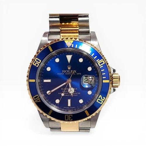 ROLEX SUBMARINER 40 MM BLUE DIAL STEEL 18K YELLOW GOLD WATCH 16613 V SERIES 2009: ROLEX SUBMARINER 40 MM BLUE DIAL STEEL 18K YELLOW GOLD WATCH Manufacturer Rolex Category Submariner Subcategory Sapphire Crystal Reference Number 16613 Additional Keywords highly desirable late-produc
