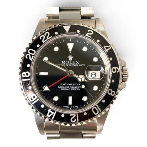 W/BOX ROLEX GMT MASTER 40 MM STEEL BLACK AUTOMATIC WATCH 16700 U SERIES 1997: W/BOX ROLEX GMT MASTER 40 MM STEEL BLACK AUTOMATIC WATCH 16700 U SERIES 1997 Manufacturer Rolex Category GMT Master Subcategory Sapphire Crystal Reference Number 16700 Additional Keywords Band Stainle