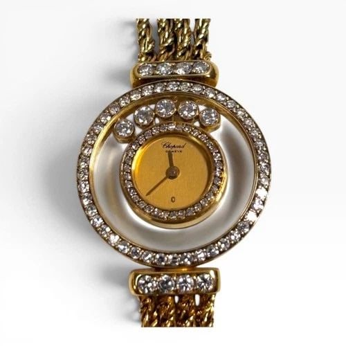 CHOPARD HAPPY DIAMONDS 23 MM 18K YELLOW GOLD CHAMPAGNE DIAL WATCH 4066: CHOPARD HAPPY DIAMONDS 23 MM 18K YELLOW GOLD CHAMPAGNE DIAL WATCH 4066 Manufacturer Chopard Category Happy Diamonds Reference Number 4066 Band Type Gold Bezel Diamonds Bezel Box No Case Mes 23 mm Case