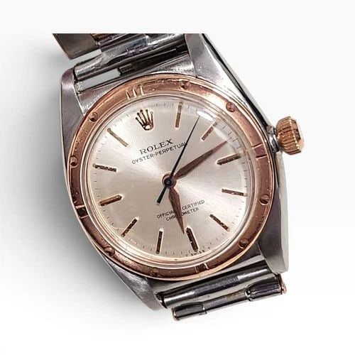 W/BOX VINTAGE ROLEX OYSTER PERPETUAL 31 MM STEEL 18K ROSE GOLD WATCH 3372: W/BOX VINTAGE ROLEX OYSTER PERPETUAL 31 MM STEEL 18K ROSE GOLD WATCH 3372 Manufacturer Rolex Category Vintage Reference Number 3372 Band Type Oyster Stainless Steel & 18K Rose Gold Bezel Milled Bezel 