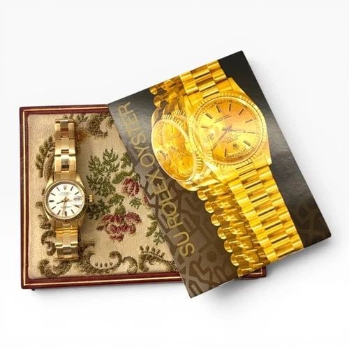 W/BOX ROLEX LADIES DATEJUST 26MM 18K YELLOW GOLD AUTOMATIC WATCH 6927 CIRCA 1974: W/BOX ROLEX LADIES DATEJUST 26MM 18K YELLOW GOLD AUTOMATIC WATCH 6927 CIRCA 1974 Manufacturer Rolex Category Ladies Datejust Subcategory Ladies Datejust 2030 Reference Number 6927 Band Yellow Gold Ban