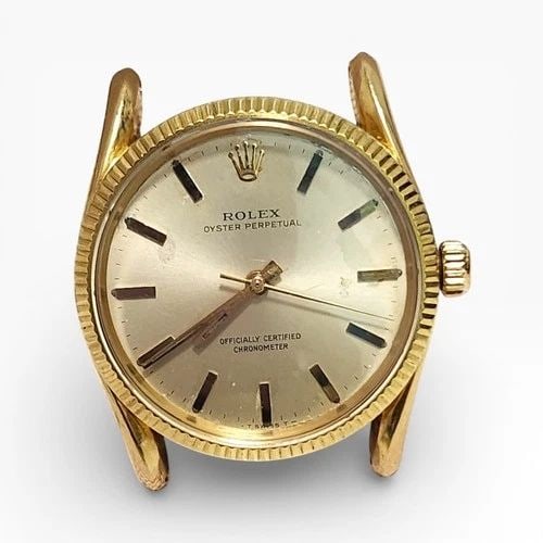 VINTAGE ROLEX OYSTER PERPETUAL 34 MM 18K YELLOW GOLD HEAD ONLY WATCH 6590: VINTAGE ROLEX OYSTER PERPETUAL 34 MM 18K YELLOW GOLD HEAD ONLY WATCH Manufacturer Rolex Category Vintage Reference Number 6590 Box No Case Mes 34 mm Dial Color Champagne Dial Function No Date Gender M