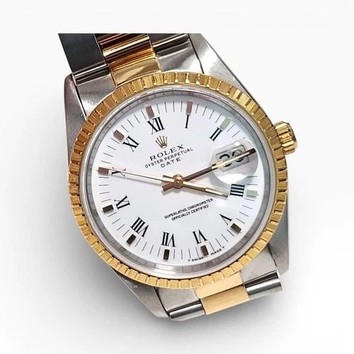 W/PAPERS 1997 ROLEX DATE 34 MM STEEL 18K YELLOW GOLD OYSTER WHITE WATCH 15223: W/PAPERS 1997 ROLEX DATE 34 MM STEEL 18K YELLOW GOLD OYSTER WHITE WATCH Manufacturer Rolex Category Mens Date 34mm Subcategory Sapphire Crystal Quick Set Reference Number 15223 Additional Keywords FUL