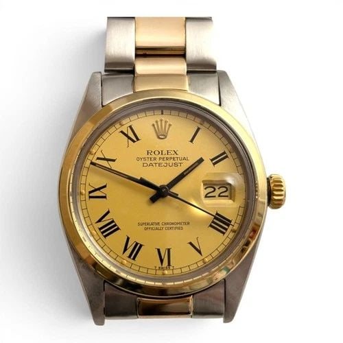 ROLEX DATEJUST 36 MM TWO TONE OYSTER CHAMPAGNE ROMAN DIAL WATCH 16003 CIRCA 1979: ROLEX DATEJUST 36 MM TWO TONE OYSTER CHAMPAGNE ROMAN DIAL WATCH 16003 CIRCA 1979 Manufacturer Rolex Category Mens Datejust 36mm Subcategory Plastic Crystal Quick Set Reference Number 16003 Band Steel 