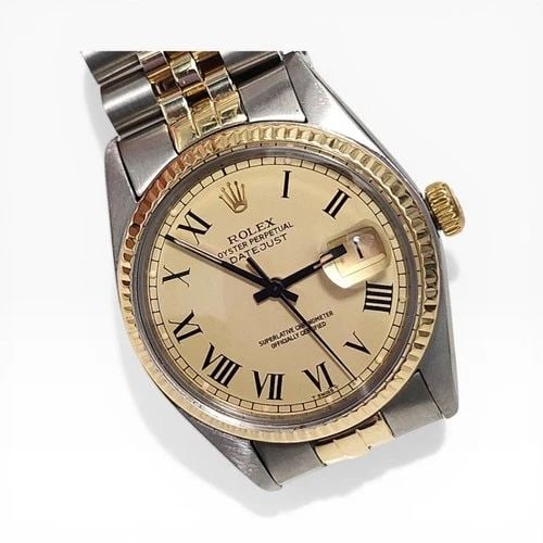 ROLEX DATEJUST 36 MM TWO TONE JUBILEE CHAMPAGNE BUCKLEY WATCH 16013 CIRCA 1979: ROLEX DATEJUST 36 MM TWO TONE JUBILEE CHAMPAGNE BUCKLEY WATCH Manufacturer Rolex Category Mens Datejust 36mm Subcategory Plastic Crystal Quick Set Reference Number 16013 Band Steel ,Yellow Gold Band C
