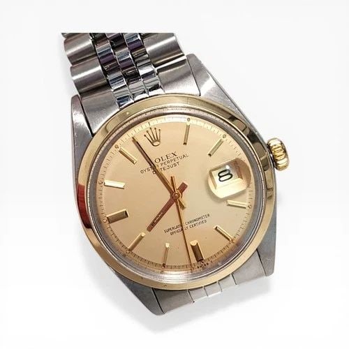 ROLEX DATEJUST 36 MM TWO TONE JUBILEE CHAMPAGNE AUTOMATIC WATCH 1600 CIRCA 1972: ROLEX DATEJUST 36 MM TWO TONE JUBILEE CHAMPAGNE AUTOMATIC WATCH Manufacturer Rolex Category Mens Datejust 36mm Subcategory Plastic Crystal Non Quick Reference Number 1600 Band Stainless Steel Band Col