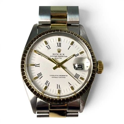 ROLEX DATE 34 MM TWO TONE WHITE ROMAN OYSTER AUTOMATIC WATCH 1505 CIRCA 1978: ROLEX DATE 34 MM TWO TONE WHITE ROMAN OYSTER AUTOMATIC WATCH 1505 CIRCA 1978 Manufacturer Rolex Category Mens Date 34mm Subcategory Plastic Crystal Non Quick Reference Number 1505 Band Steel ,Yellow G