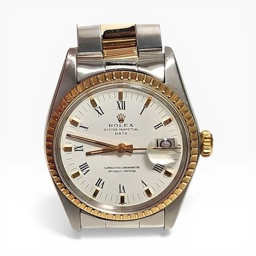 ROLEX DATE 34 MM TWO TONE OYSTER WHITE ROMAN AUTOMATIC WATCH 1505 CIRCA 1978: ROLEX DATE 34 MM TWO TONE OYSTER WHITE ROMAN AUTOMATIC WATCH 1505 CIRCA 1978 Manufacturer Rolex Category Mens Date 34mm Subcategory Plastic Crystal Non Quick Reference Number 1505 Band Stainless Steel