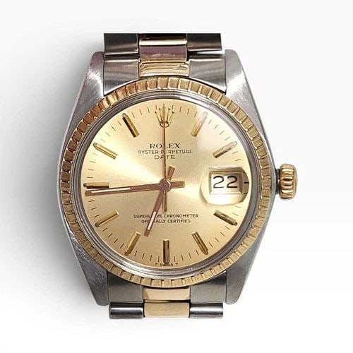 ROLEX DATE 34 MM TWO TONE CHAMPAGNE OYSTER AUTOMATIC WATCH 1505 CIRCA 1979: ROLEX DATE 34 MM TWO TONE CHAMPAGNE OYSTER AUTOMATIC WATCH 1505 CIRCA 1979 Manufacturer Rolex Category Mens Date 34mm Subcategory Plastic Crystal Non Quick Reference Number 1505 Band Steel ,Yellow Gol
