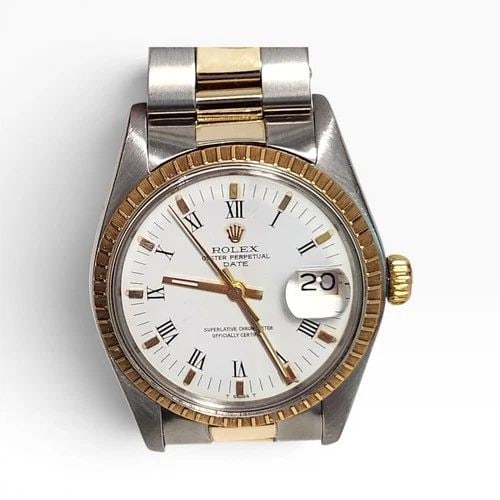 ROLEX DATE 34 MM TWO TONE OYSTER WHITE ROMAN AUTOMATIC WATCH 1500 CIRCA 1978: ROLEX DATE 34 MM TWO TONE OYSTER WHITE ROMAN AUTOMATIC WATCH 1500 CIRCA 1978 Manufacturer Rolex Category Mens Date 34mm Subcategory Plastic Crystal Non Quick Reference Number 1500 Band Steel ,Yellow G