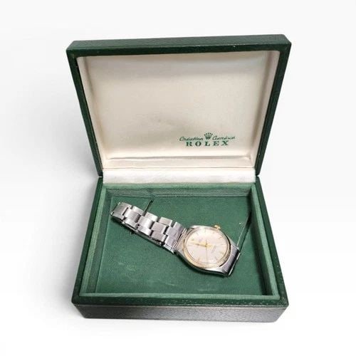 W/BOX ROLEX OYSTER PERPETUAL 34 MM TWO TONE AUTOMATIC WATCH 1005 CIRCA 1966: W/BOX ROLEX OYSTER PERPETUAL 34 MM TWO TONE AUTOMATIC WATCH 1005 CIRCA 1966 Manufacturer Rolex Category Mens No Date 34mm Subcategory Plastic Crystal Reference Number 1005 Band Stainless Steel Band Co