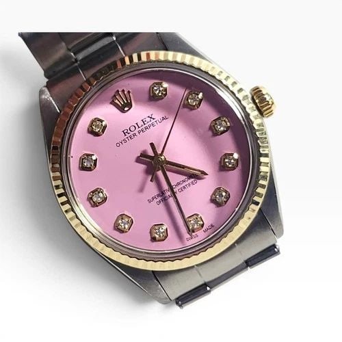 ROLEX OYSTER PERPETUAL 34 MM CANDY PINK DIAMOND TWO TONE WATCH 5500 CIRCA 1966: ROLEX OYSTER PERPETUAL 34 MM CANDY PINK DIAMOND TWO TONE WATCH 5500 CIRCA 1966 Manufacturer Rolex Category Oyster Perpetual Reference Number 5500 Additional Keywords CANDY PINK Band Stainless Steel Ba